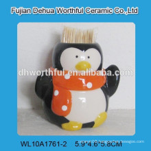 Ceramic toothpick holder with penguin design
